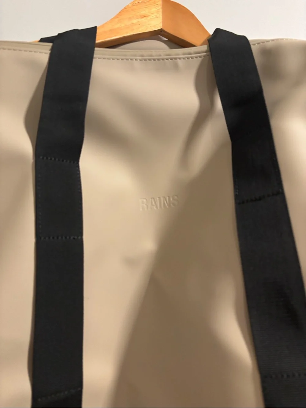 Rains Hilo Duffel Bag in Taupe with Black Straps